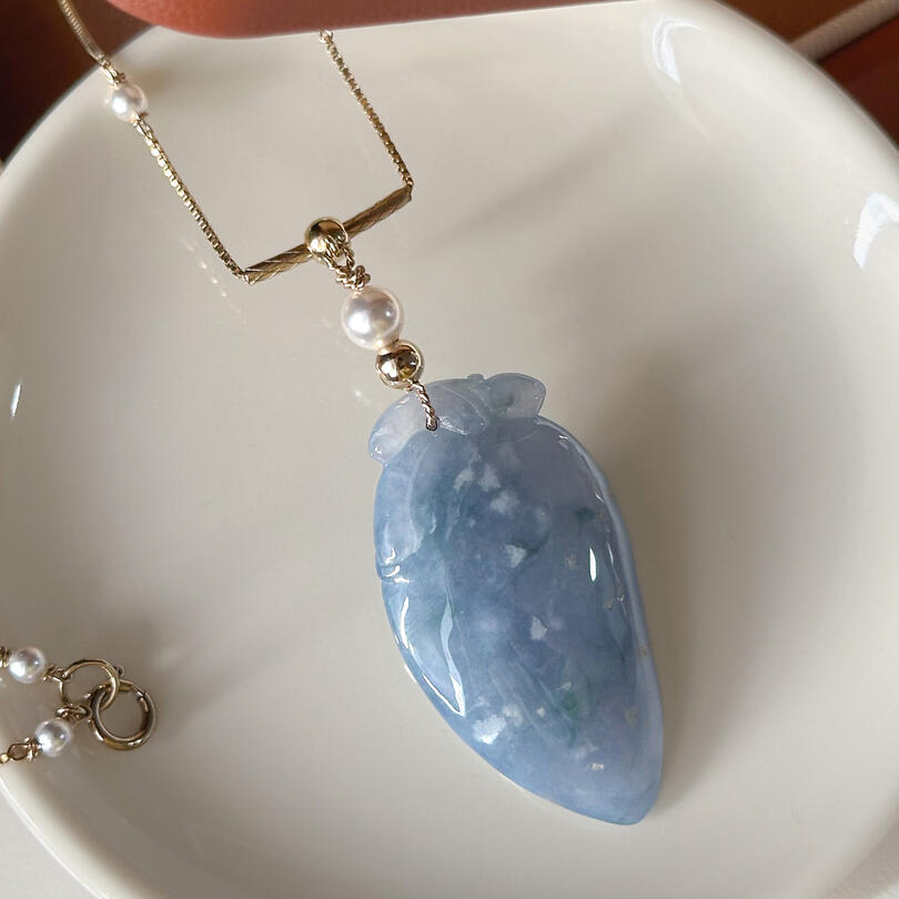 Purple Jadeite pendant with gold colour beads and pearl beads made into a bail strung on a gold chain