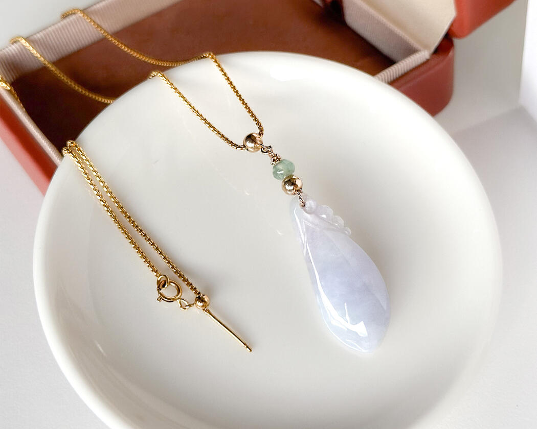 Lavender Tinted Teardrop Shaped Jadeite Pendant Close up
