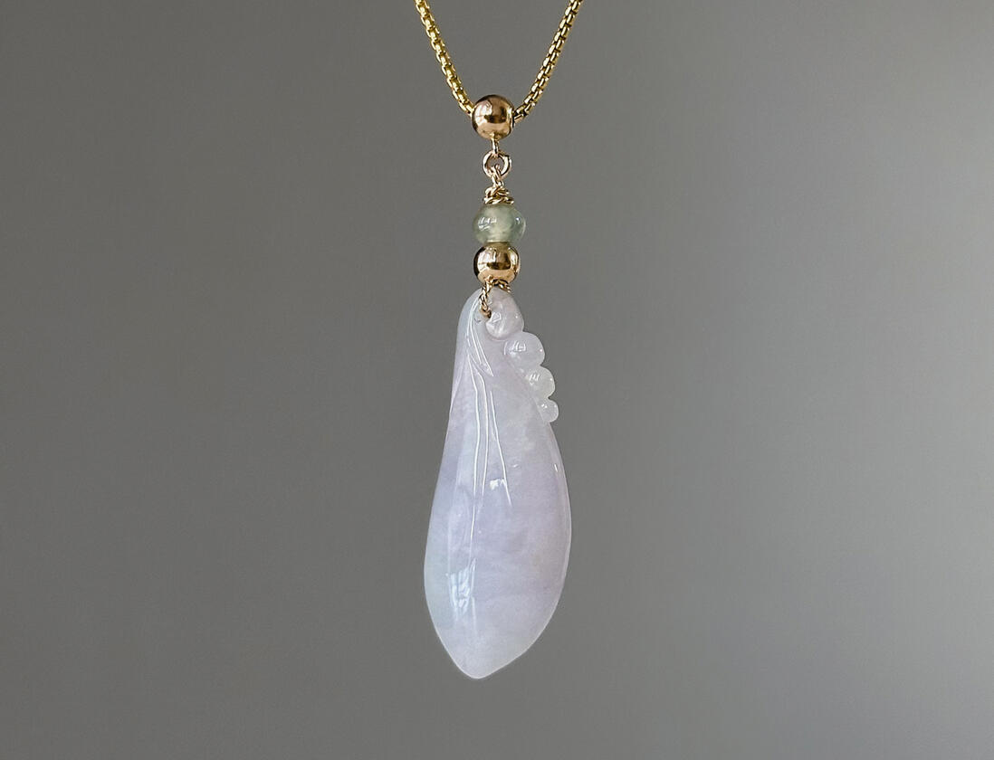 Lavender Tinted Teardrop Shaped Jadeite Pendant hanging